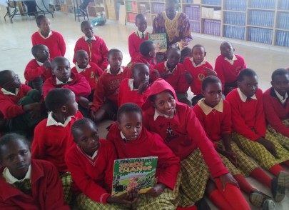 Students in Kenya with their copies of Seeds of Change